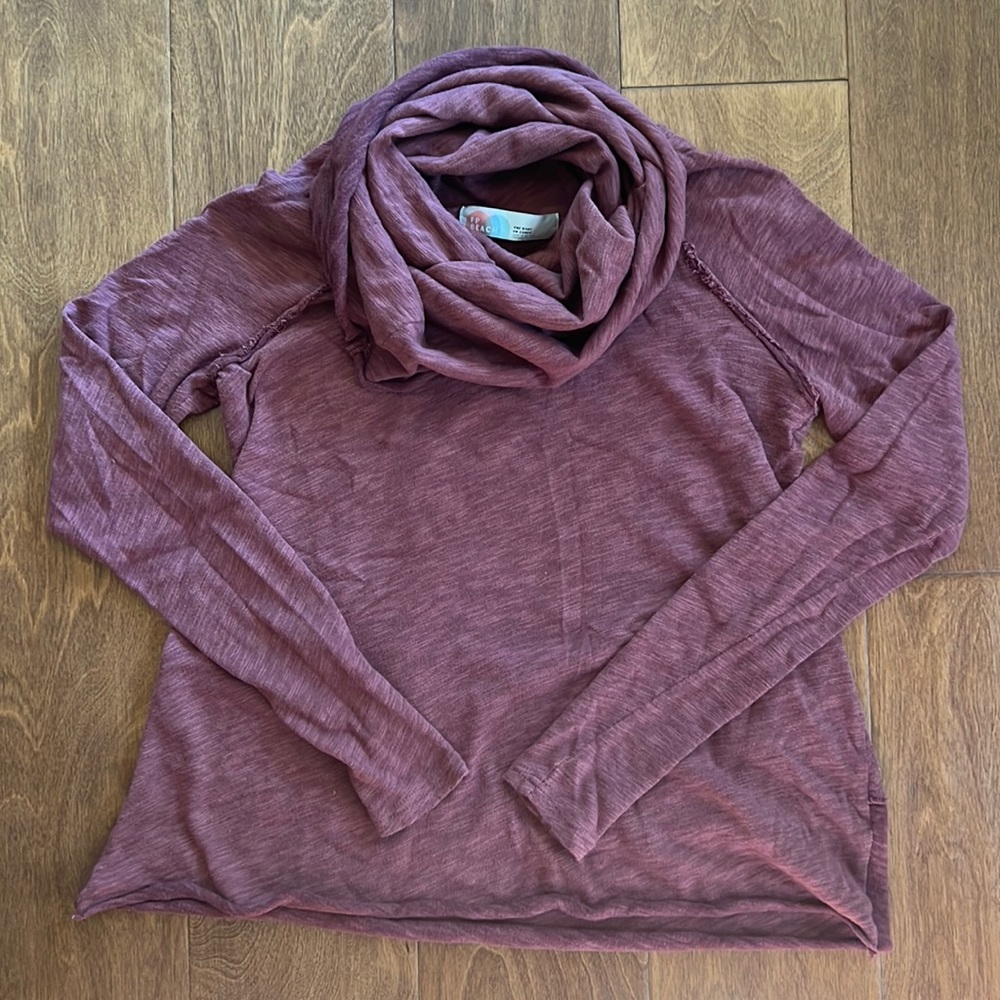 Woman’s funnel neck tunic sweater